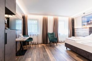 Postel nebo postele na pokoji v ubytování Hotel Demas München-Unterhaching