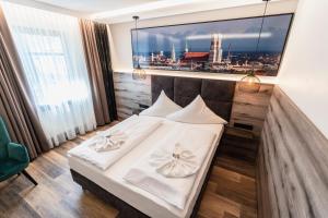 Postel nebo postele na pokoji v ubytování Hotel Demas München-Unterhaching