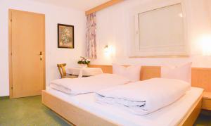 Cama o camas de una habitación en Apart Waldblick