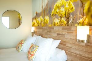 Postel nebo postele na pokoji v ubytování Hotel Costa Salina