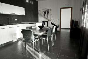 Kuchyň nebo kuchyňský kout v ubytování inStile aparthotel