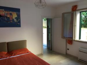 Posteľ alebo postele v izbe v ubytovaní Residence B&B il Connubio