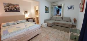 Apartman Šego客房内的一张或多张床位