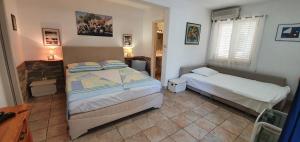 Apartman Šego客房内的一张或多张床位