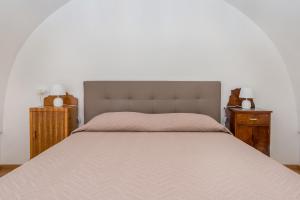 Postel nebo postele na pokoji v ubytování La Vite Bianca