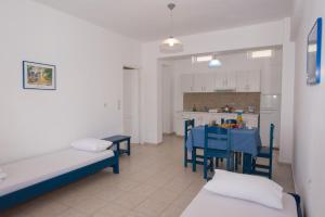 Kuchyň nebo kuchyňský kout v ubytování Nymphs Rooms & Apartments