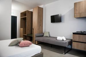 Posteľ alebo postele v izbe v ubytovaní Case vacanza Puccini