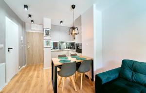 Kuchyňa alebo kuchynka v ubytovaní LAGUNA Apartament Polanica Residence 17