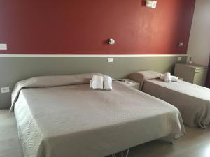 Кровать или кровати в номере Agriturismo Orlandi
