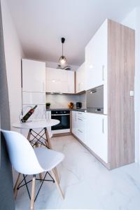 Kuchyňa alebo kuchynka v ubytovaní Estella Apartment