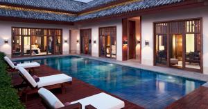 Bazén v ubytování Sanya LUHUITOU Resort & Spa nebo v jeho okolí