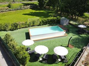 The swimming pool at or close to Villa Moiacchina Luxury Home