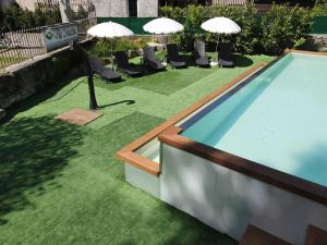 The swimming pool at or close to Villa Moiacchina Luxury Home