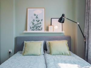 Postel nebo postele na pokoji v ubytování Baszta Jacek AON Apartament Gdańsk