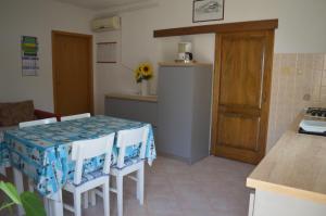 Kuchyňa alebo kuchynka v ubytovaní Rooms & Apartments Kvasić