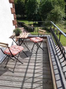 Ein Balkon oder eine Terrasse in der Unterkunft Gästehaus Herrenmühle