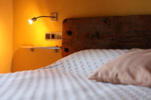 Posteľ alebo postele v izbe v ubytovaní Hotel rural Font del Genil