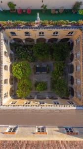 an aerial view of an apartment building with plants at Il Chiostro in Massa Lubrense