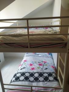 Postel nebo postele na pokoji v ubytování Apartamento Castelao illa de arousa + 2 fotografie