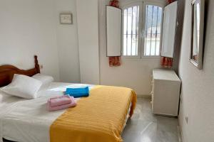 Ένα ή περισσότερα κρεβάτια σε δωμάτιο στο Precioso apartamento en Mojacar Pueblo
