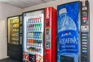 a soda machine with a large bottle of water at Studio 6 Extended Stay - Atlanta, GA - Chamblee in Atlanta