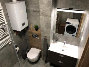 Koupelna v ubytování Apartament Baltic Residence Pobierowo + 7 fotografií