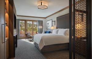 A bed or beds in a room at Montage Big Sky