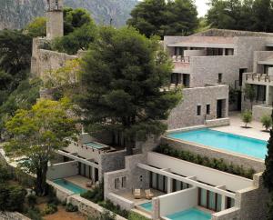 an image of a building with two swimming pools at Nafplia Palace Hotel & Villas in Nafplio