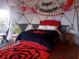 A bed or beds in a room at Glamping hermoso amanecer