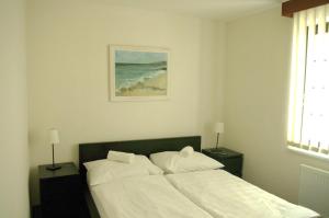 Postelja oz. postelje v sobi nastanitve Hotel Širák