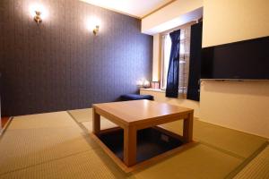 TV a/nebo společenská místnost v ubytování U-Community Hotel