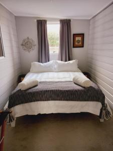 Ein Bett oder Betten in einem Zimmer der Unterkunft Beach House