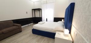 Rome Aparts客房内的一张或多张床位