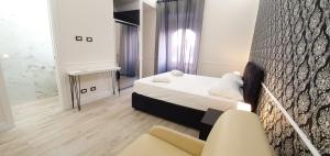 Rome Aparts客房内的一张或多张床位