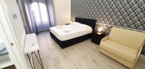 Rome Aparts客房内的一张或多张床位