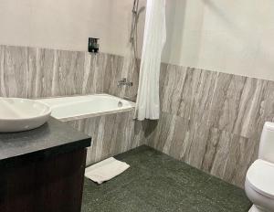 Kylpyhuone majoituspaikassa The Nakula Villas