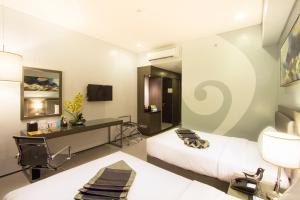 Televiisor ja/või meelelahutuskeskus majutusasutuses Bayfront Hotel Cebu North Reclamation