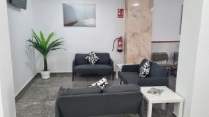 Posezení v ubytování Hostal Nerjasol