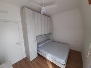Posteľ alebo postele v izbe v ubytovaní Casa Stella Marina