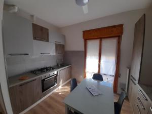 Kuchyňa alebo kuchynka v ubytovaní Casa Stella Marina + 7 fotografií