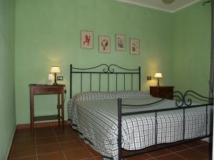Postel nebo postele na pokoji v ubytování Agriturismo Poggio Sassineri