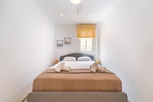 Postel nebo postele na pokoji v ubytování Myflats Premium Santa Pola