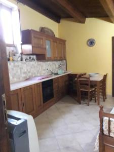 Kuchyň nebo kuchyňský kout v ubytování B&B Corso Italo Balbo