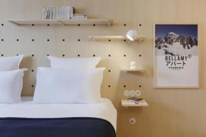 Кровать или кровати в номере Appart'hôtel Bellamy Chamonix