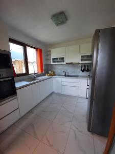 A kitchen or kitchenette at Mountain Villa near Bansko