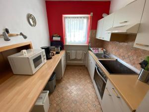 Kuchyň nebo kuchyňský kout v ubytování Ferienwohnung Fackelmann