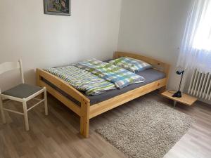 Postel nebo postele na pokoji v ubytování Ferienwohnung Fackelmann