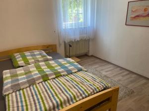Postel nebo postele na pokoji v ubytování Ferienwohnung Fackelmann