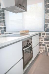 Dapur atau dapur kecil di Acantha Villas