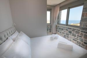 Katil atau katil-katil dalam bilik di Acantha Villas